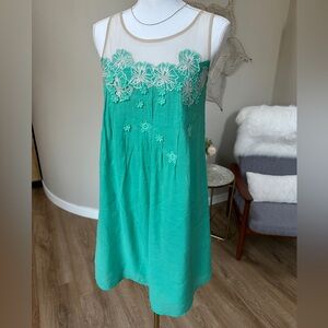 Sleeveless midi shift dress with sheer straps and hibiscus floral appliqués